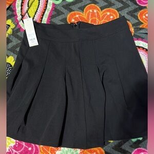 Francesca’s black shirt. Size small. New with tags.